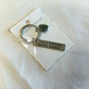 NEW WITH TAGS!! Vegetarian key chain reads “Yes, I get enough f***ing protein”